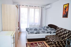 Posteľ alebo postele v izbe v ubytovaní SovaApartman