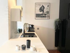 Kuchyňa alebo kuchynka v ubytovaní CHILLIapartamenty- STUDIO