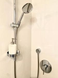 Kúpeľňa v ubytovaní CHILLIapartamenty- STUDIO