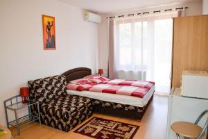 Posteľ alebo postele v izbe v ubytovaní SovaApartman