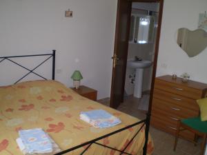 Postel nebo postele na pokoji v ubytování Agriturismo Ternova