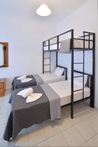 Posteľ alebo postele v izbe v ubytovaní Apartments Kalina