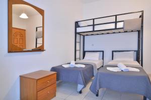 Posteľ alebo postele v izbe v ubytovaní Apartments Kalina