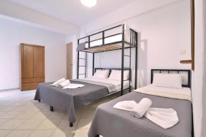 Posteľ alebo postele v izbe v ubytovaní Apartments Kalina