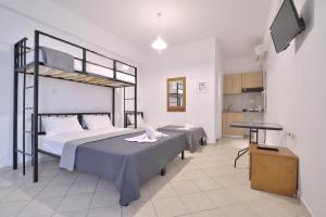 Posteľ alebo postele v izbe v ubytovaní Apartments Kalina