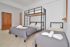 Posteľ alebo postele v izbe v ubytovaní Apartments Kalina