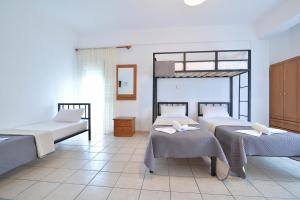 Posteľ alebo postele v izbe v ubytovaní Apartments Kalina