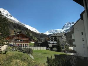 a view of a village in the mountains at Siesta 3,5-Zimmer-Wohnung in Leukerbad