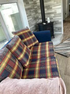 Postel nebo postele na pokoji v ubytování Junes cosy apartment