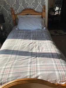 Postel nebo postele na pokoji v ubytování Junes cosy apartment