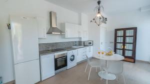 Kuchyň nebo kuchyňský kout v ubytování Casita de Jero Coín by Ruralidays