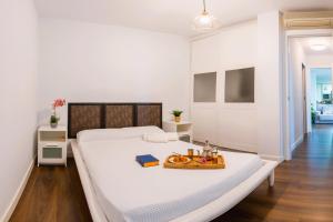 Posteľ alebo postele v izbe v ubytovaní SANTA PAULA LOFT