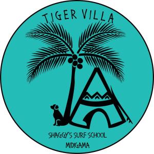 a palm tree and a letter a with a school logo at Tiger Villa in Midigama East