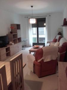 Posezení v ubytování Vivienda vacacional con garaje Vistas a Mágina