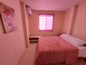 מיטה או מיטות בחדר ב-Casa Vacacional en Conjunto Privado
