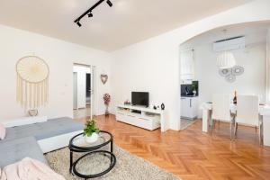 TV a/nebo společenská místnost v ubytování Apartments Come&Stay