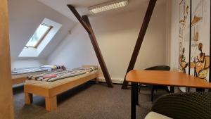 Postel nebo postele na pokoji v ubytování Hotel Rada