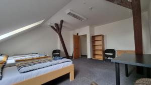 Postel nebo postele na pokoji v ubytování Hotel Rada