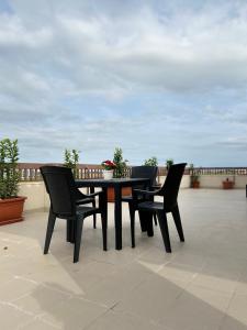 A balcony or terrace at NSM Casa di Fulmine attico con box privato