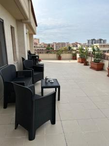 A balcony or terrace at NSM Casa di Fulmine attico con box privato