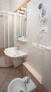 Ванная комната в Hotel Anna