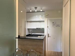 Kuchyňa alebo kuchynka v ubytovaní HORTENSIA Suite Puerto Banus