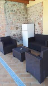 Posezení v ubytování Residence Buca di Bacco