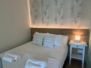 Posteľ alebo postele v izbe v ubytovaní HORTENSIA Suite Puerto Banus