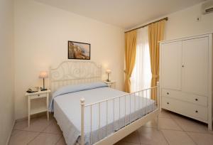 Кровать или кровати в номере Hotel Anna