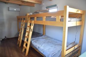 Postel nebo postele na pokoji v ubytování 伯方plus+