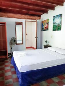 Ένα ή περισσότερα κρεβάτια σε δωμάτιο στο Casa de Los Berrios