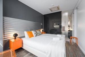 Postel nebo postele na pokoji v ubytování GuestReady - A polished retreat near St Catarina