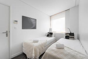 Postel nebo postele na pokoji v ubytování GuestReady - A polished retreat near St Catarina