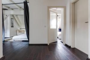 Posteľ alebo postele v izbe v ubytovaní Spacious stylish attic in the heart of the center - Karlovo