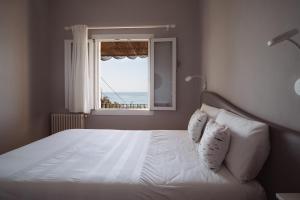 Postel nebo postele na pokoji v ubytování Villa Solaria + 27 fotografií