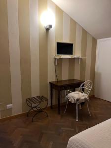 Sjónvarps- og/eða afþreyingartæki á B&B Artincentro