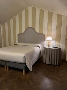 Voodi või voodid majutusasutuse B&B Artincentro toas