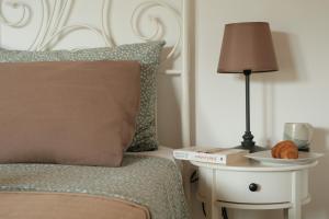 Ένα ή περισσότερα κρεβάτια σε δωμάτιο στο Lefka Apartment