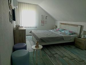 Postel nebo postele na pokoji v ubytování Lučić GUESTHOUSE