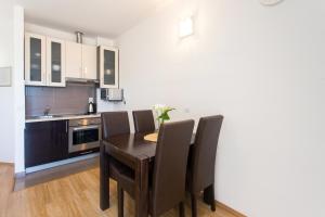 Kuchyň nebo kuchyňský kout v ubytování Angolo Apartments