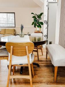 a dining room with a table and chairs at SunStar Alaska Bed and Breakfast LLC in Anchorage