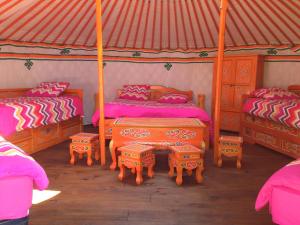 Postel nebo postele na pokoji v ubytování Camping Domaine de Mepillat