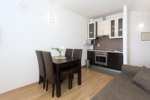 Kuchyň nebo kuchyňský kout v ubytování Angolo Apartments