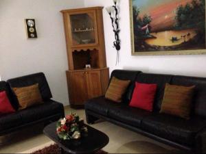 אזור ישיבה ב-The Valley Maisonette with private pool in M'scala