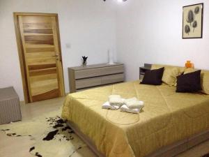 מיטה או מיטות בחדר ב-The Valley Maisonette with private pool in M'scala