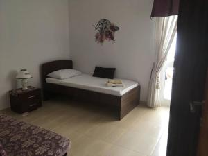 מיטה או מיטות בחדר ב-The Valley Maisonette with private pool in M'scala
