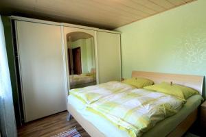 Postel nebo postele na pokoji v ubytování Ferienwohnung Am Moor