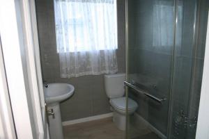 Ένα μπάνιο στο Panoramic sea views - loft apartment
