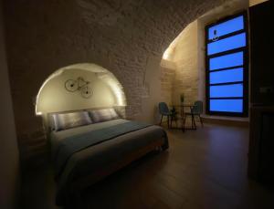 Postel nebo postele na pokoji v ubytování Regina Bona Rooms