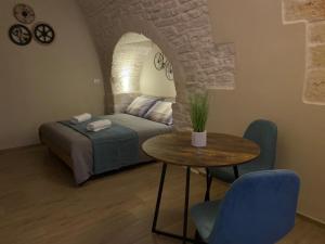 Postel nebo postele na pokoji v ubytování Regina Bona Rooms